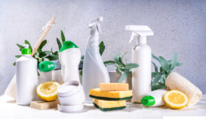 Cleaning supplies in various bottles, waiting to have their product label attached