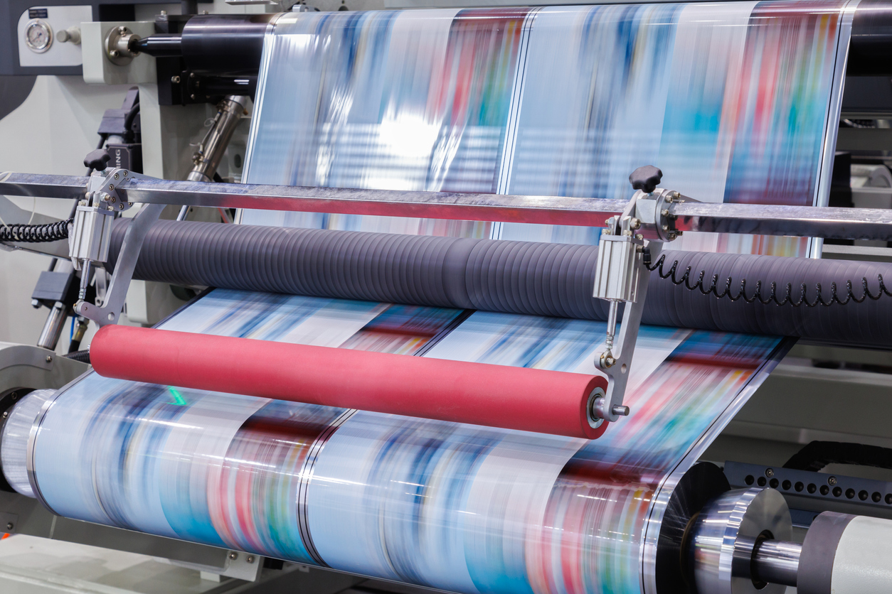 A label printing machine quickly churning out colorful product labels